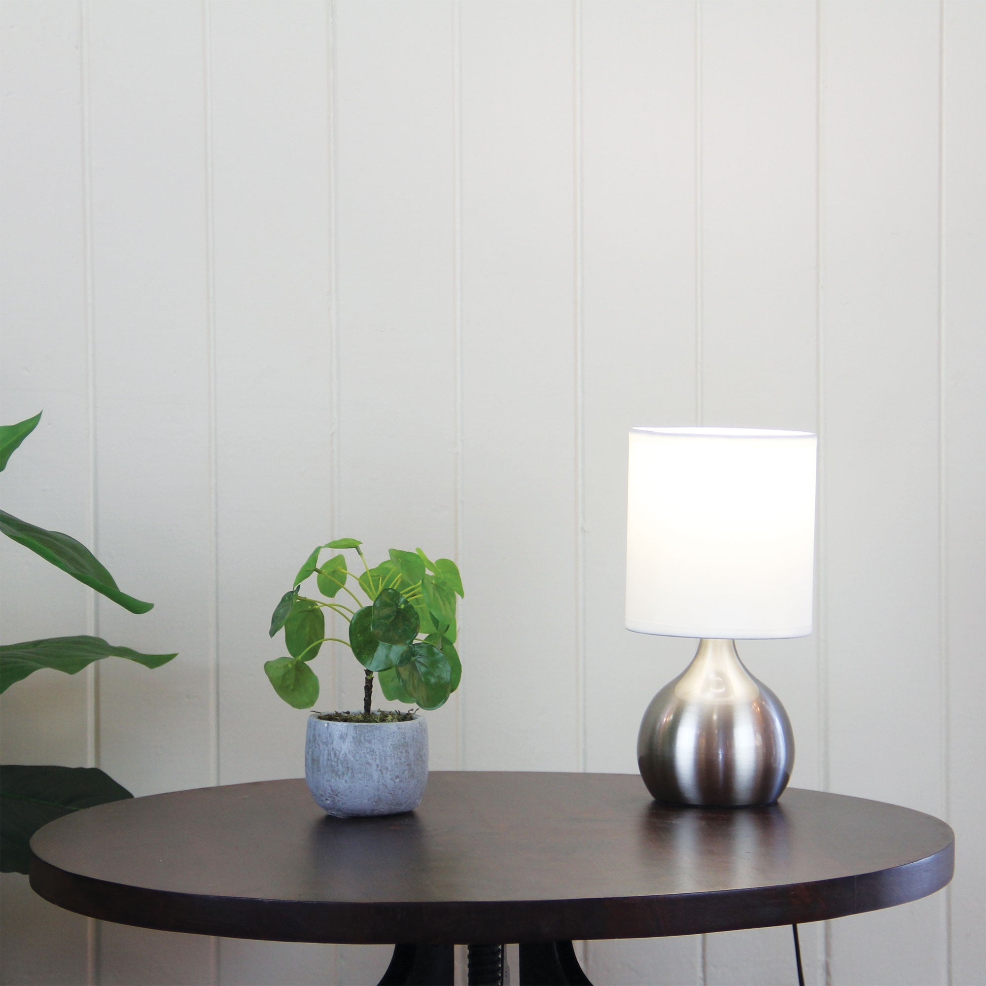 Lotti ON / OFF Touch Lamp Brushed Chrome Finish styled in a room