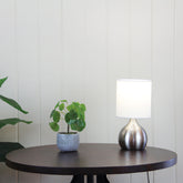 Lotti ON / OFF Touch Lamp Brushed Chrome Finish styled in a room