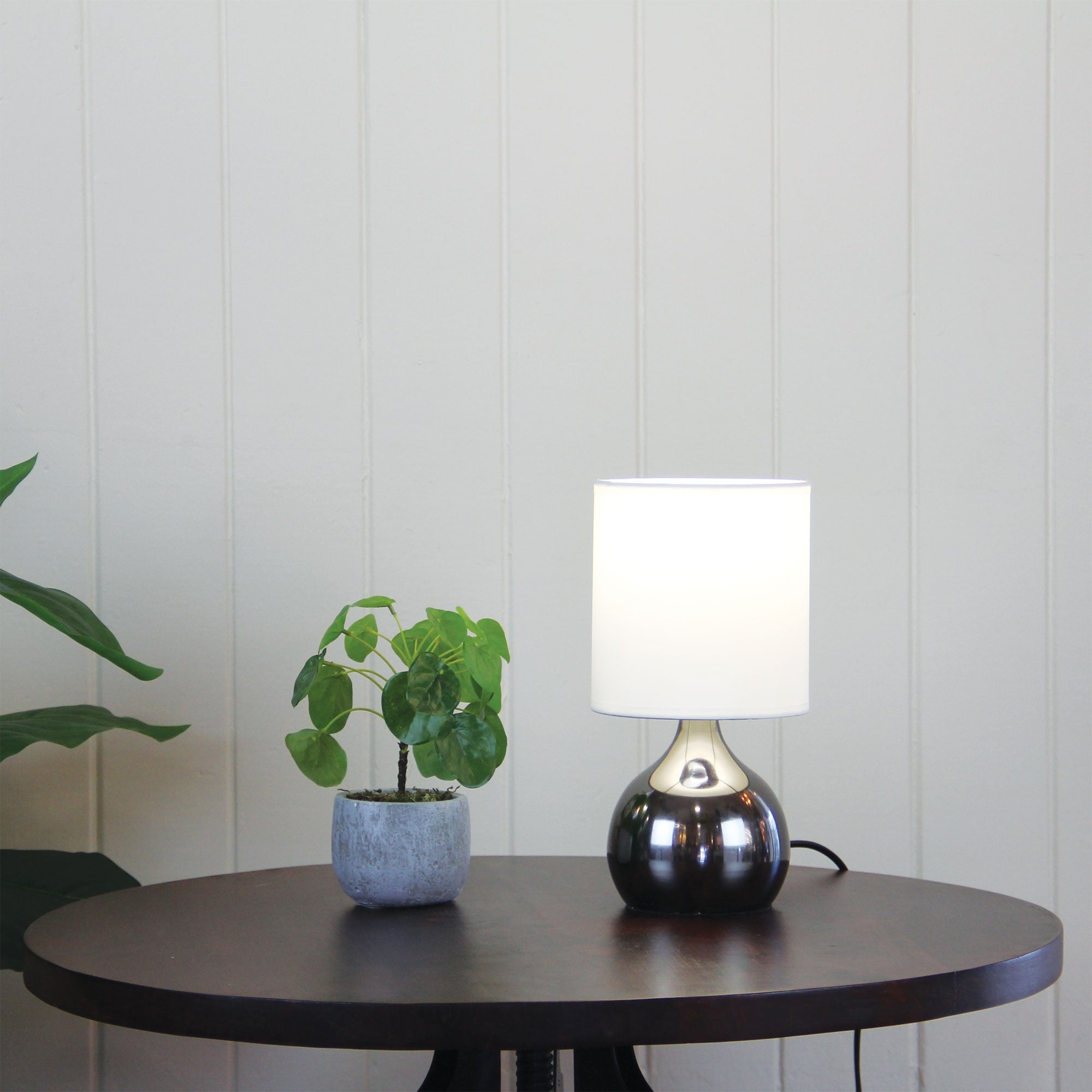 Lotti Gunmetal ON / OFF Touch Lamp in Gunmetal Finish styled in a room