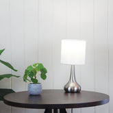 Lola ON / OFF Touch Lamp Brushed Chrome Finish styled in a room