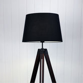 Trevi Complete Complete Base and Shade Floor Lamp styled in a room