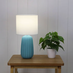 Benjy.20 Blue Ceramic Table Lamp styled in a room