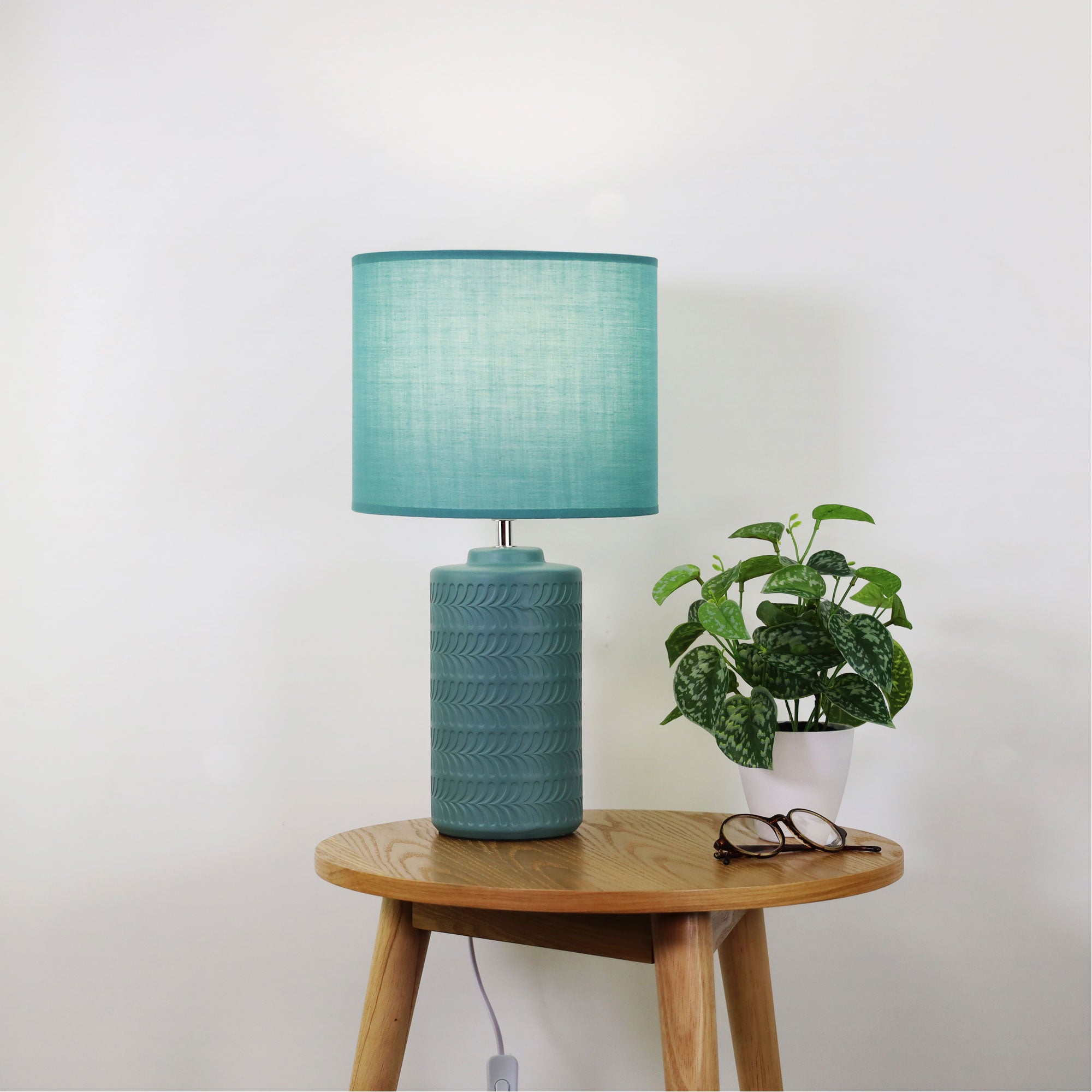 Jenny Green Ceramic Table Lamp styled in a room