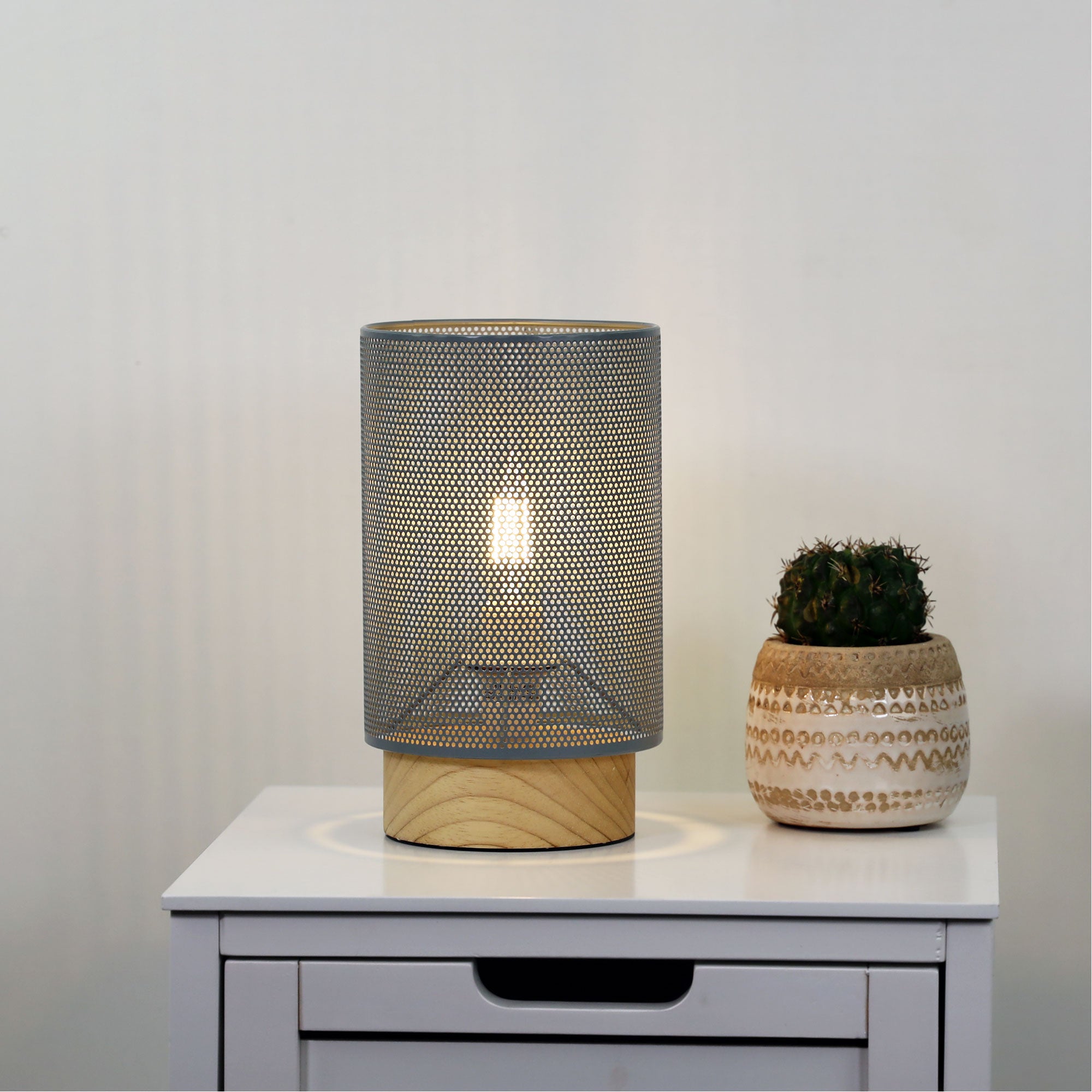 Lenny Mesh Bedside Lamp in Grey styled in a room