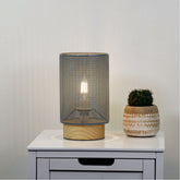 Lenny Mesh Bedside Lamp in Grey styled in a room