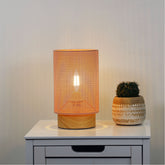 Lenny Mesh Bedside Lamp in Pink styled in a room