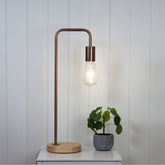 Lane Copper Scandi Table Lamp Copper with Timber styled in a room