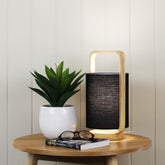 Lucia Natural Timber and Black Cotton Lamp styled in a room