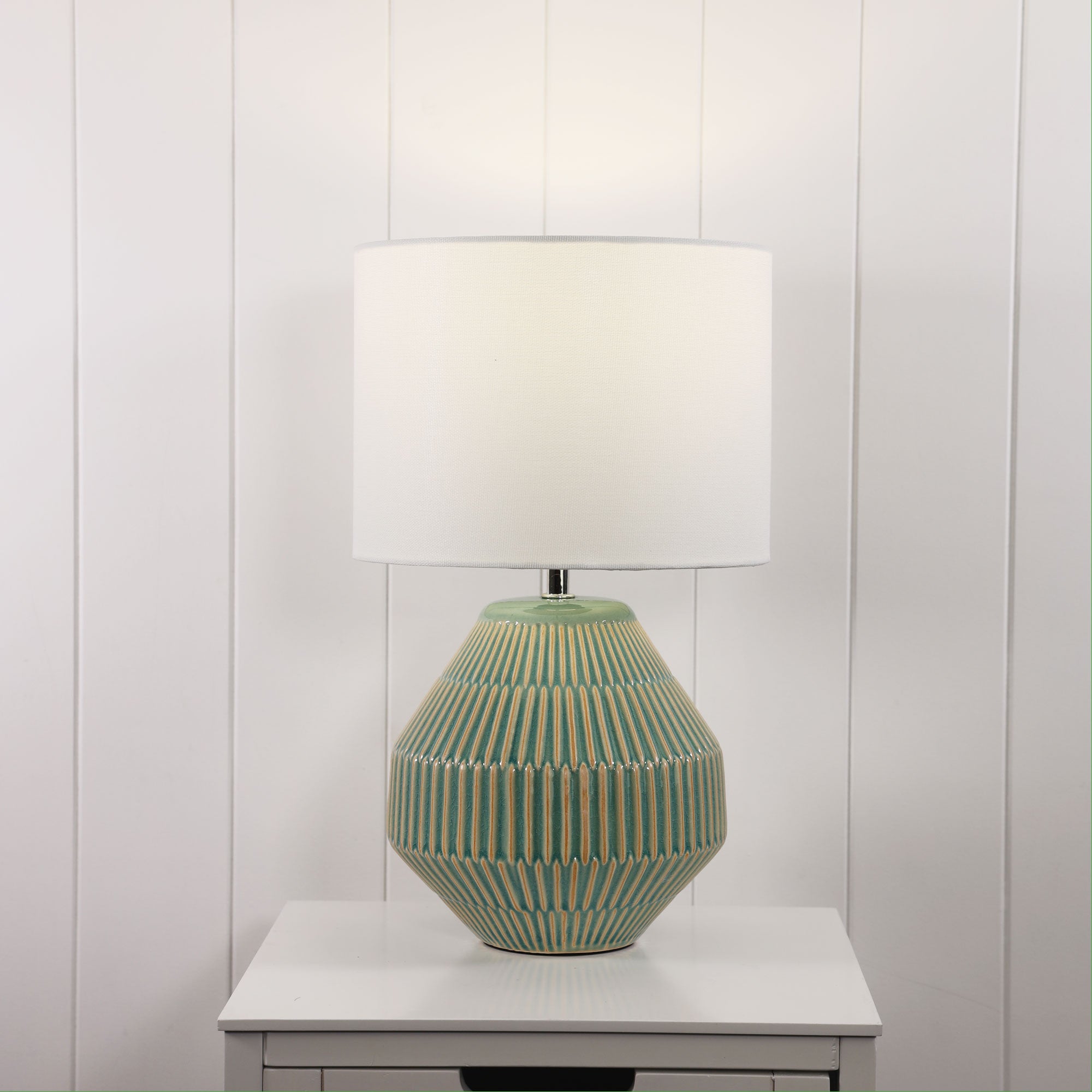 Maya Ceramic Table Lamp styled in a room