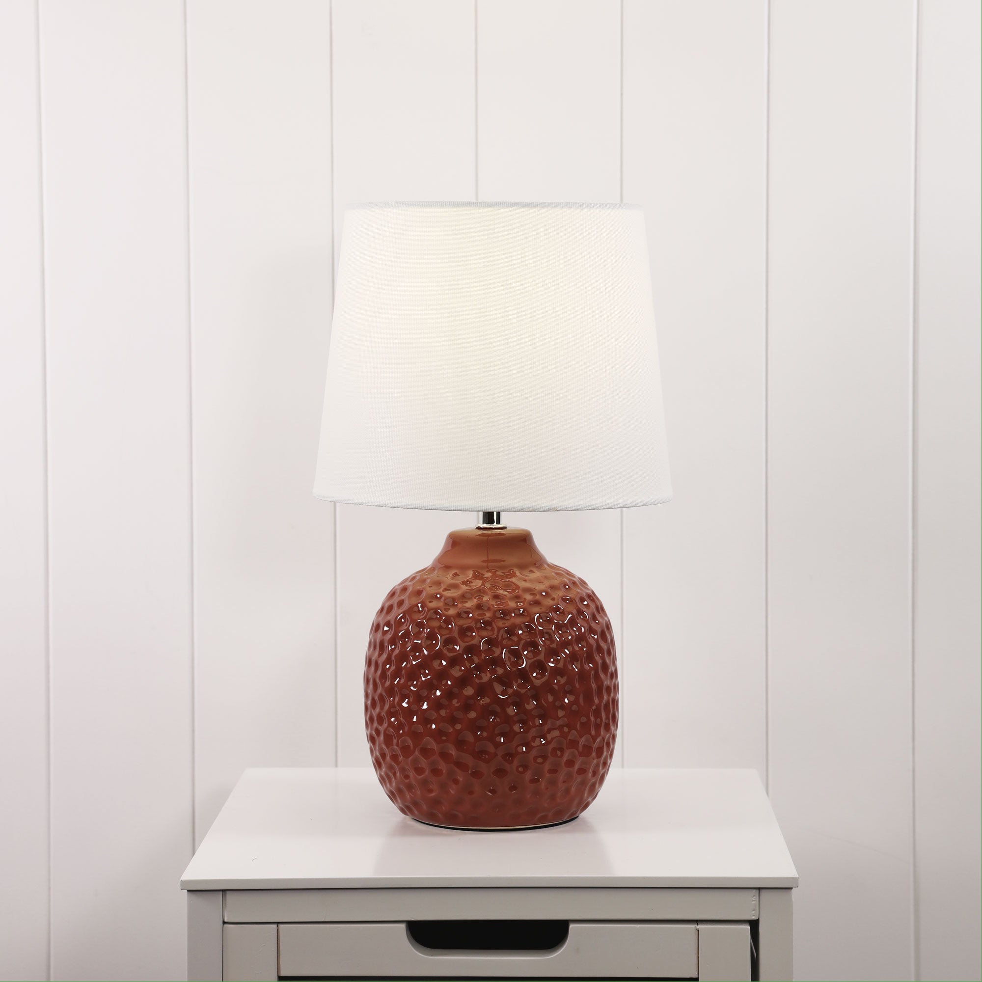 Lilia Ceramic Table Lamp styled in a room
