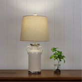 Whitby Distressed Ceramic Lamp with Harp Shade styled in a room