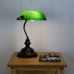 Bankers Black with Green Glass Shade Desk Lamp styled in a room