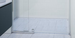 Polished silver hobless shower doorway with sill-less kit installed