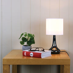 Lola Gunmetal ON / OFF Touch Lamp in Gunmetal Finish styled in a room