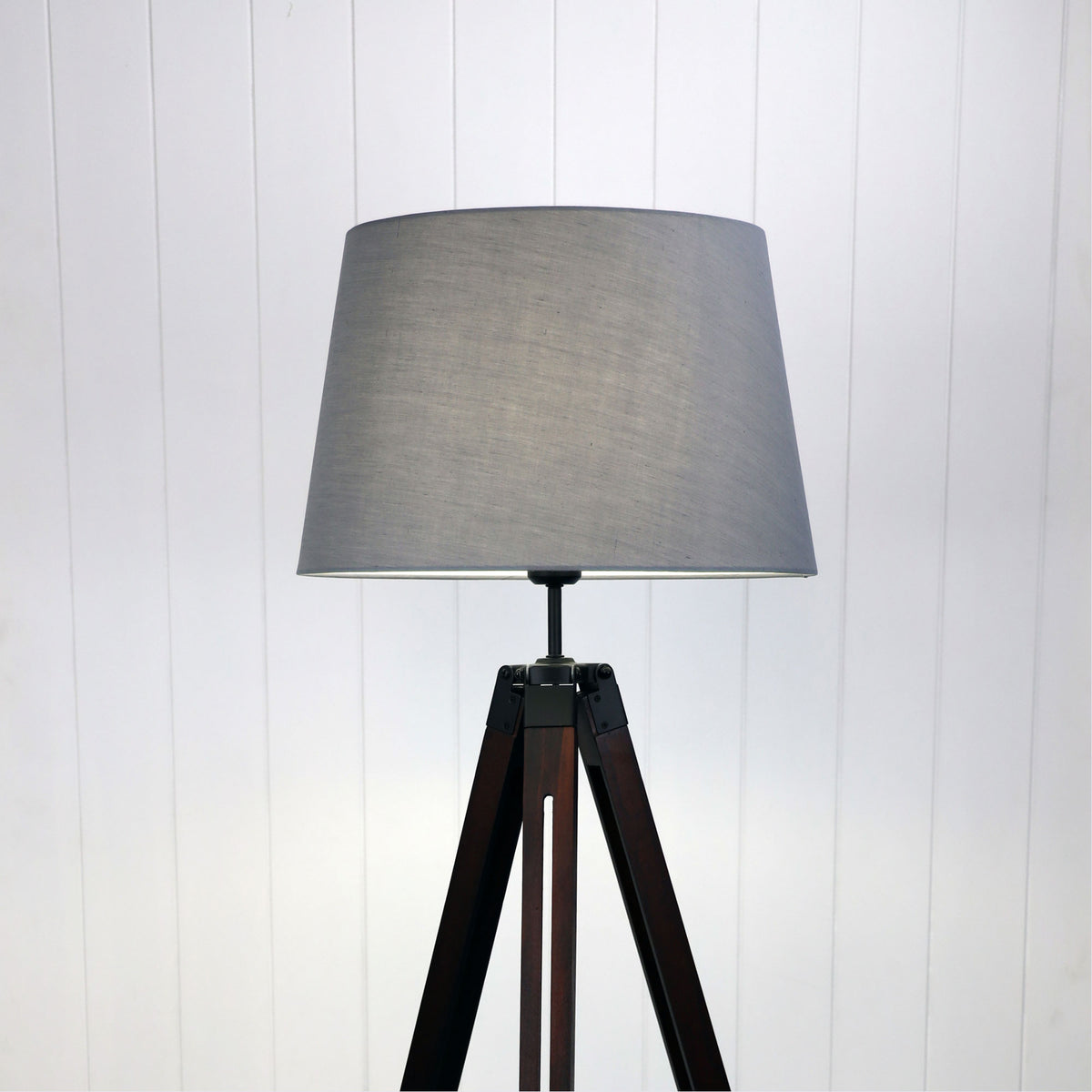 Trevi Complete Complete Base and Shade Floor Lamp styled in a room