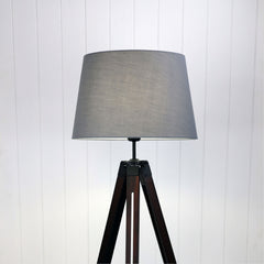 Trevi Complete Complete Base and Shade Floor Lamp styled in a room