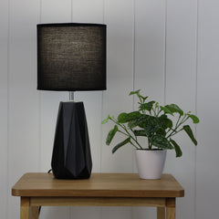 Shelly Black Ceramic Table Lamp styled in a room