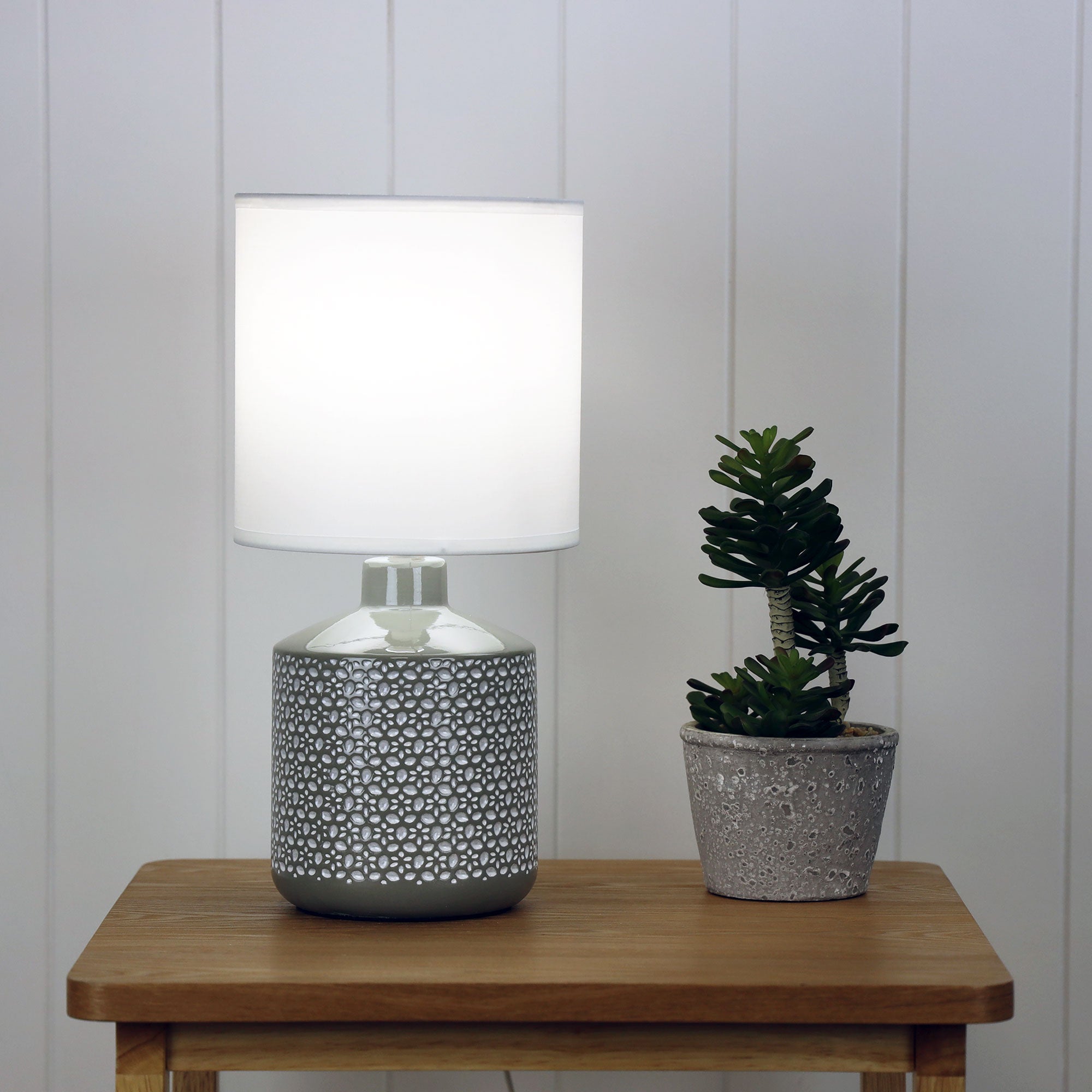 Celia Grey Ceramic Table Lamp styled in a room