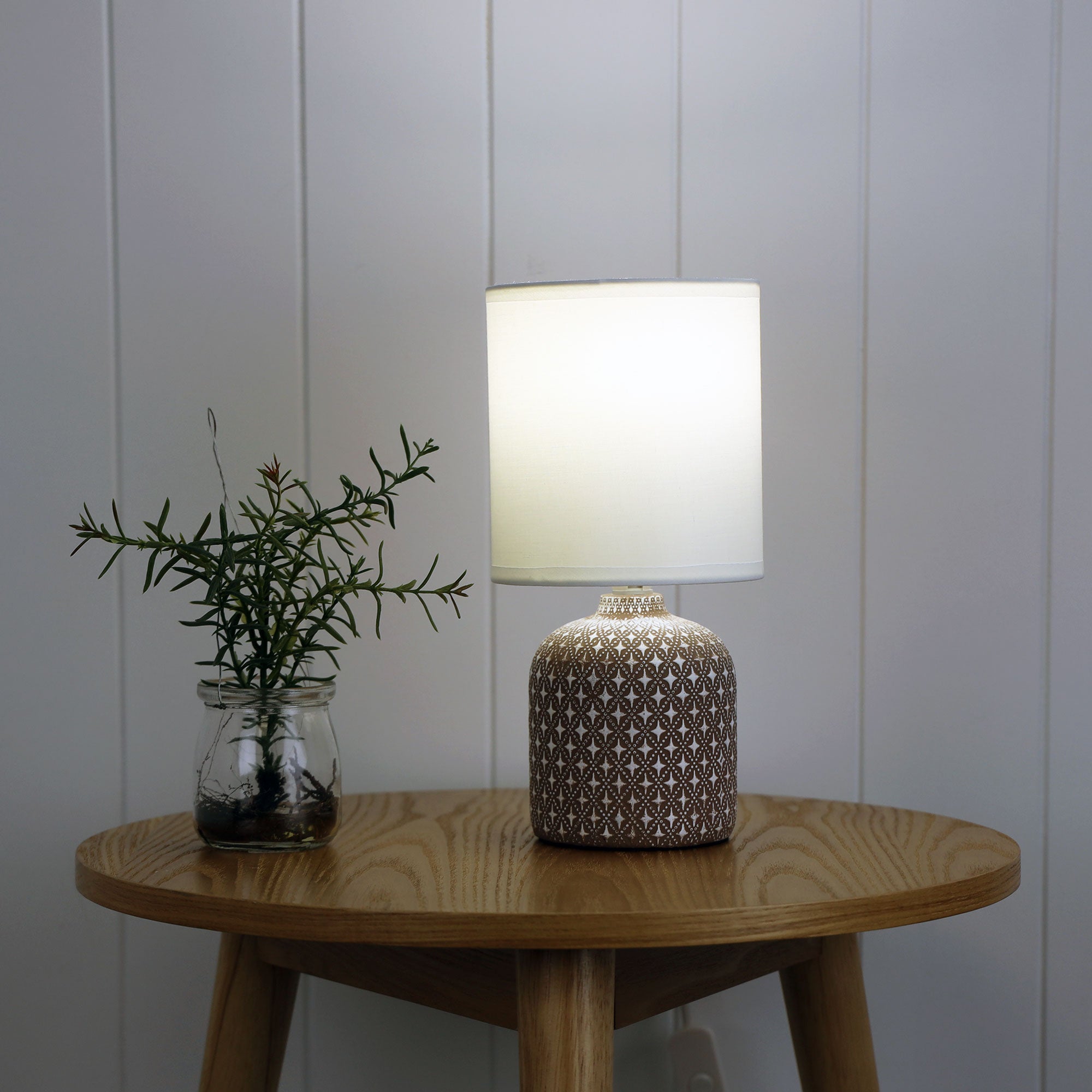 Vera Taupe Taupe Ceramic Table Lamp styled in a room