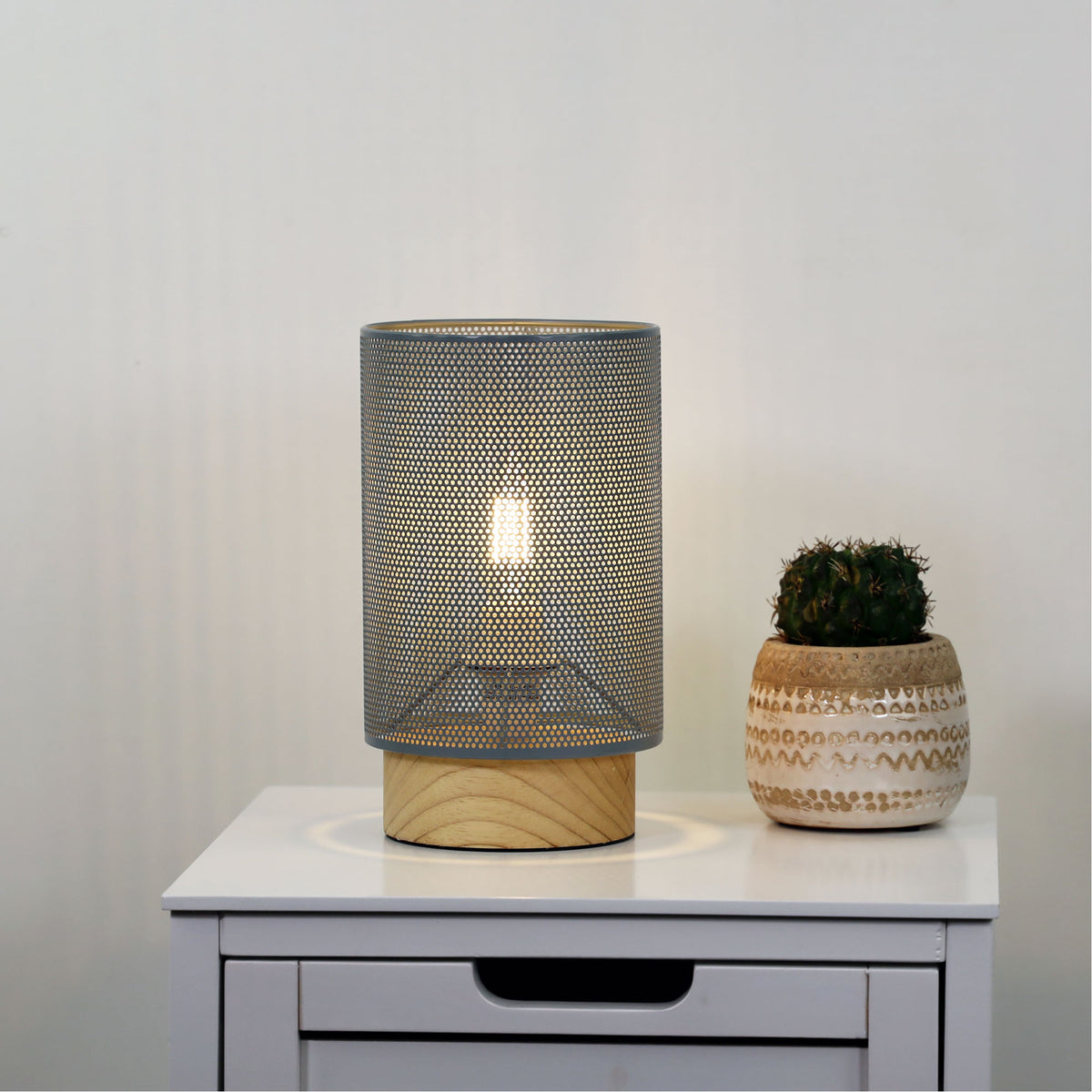 Lenny Mesh Bedside Lamp in Grey styled in a room