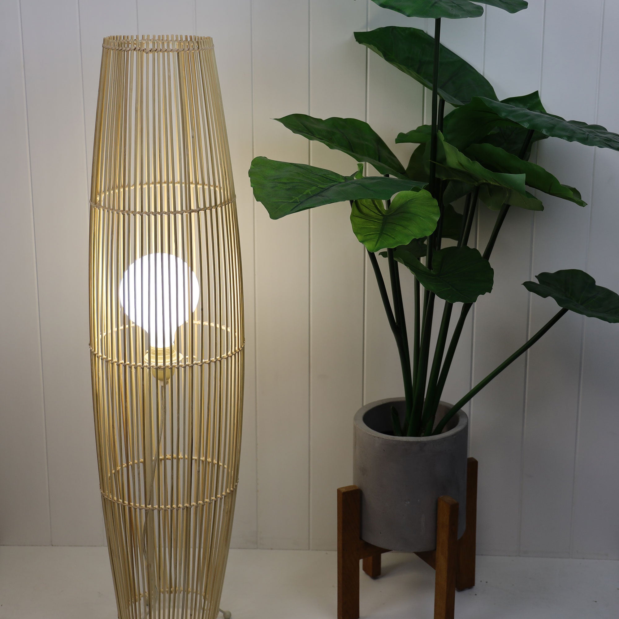 Matram Rattan Cane Floor Lamp styled in a room