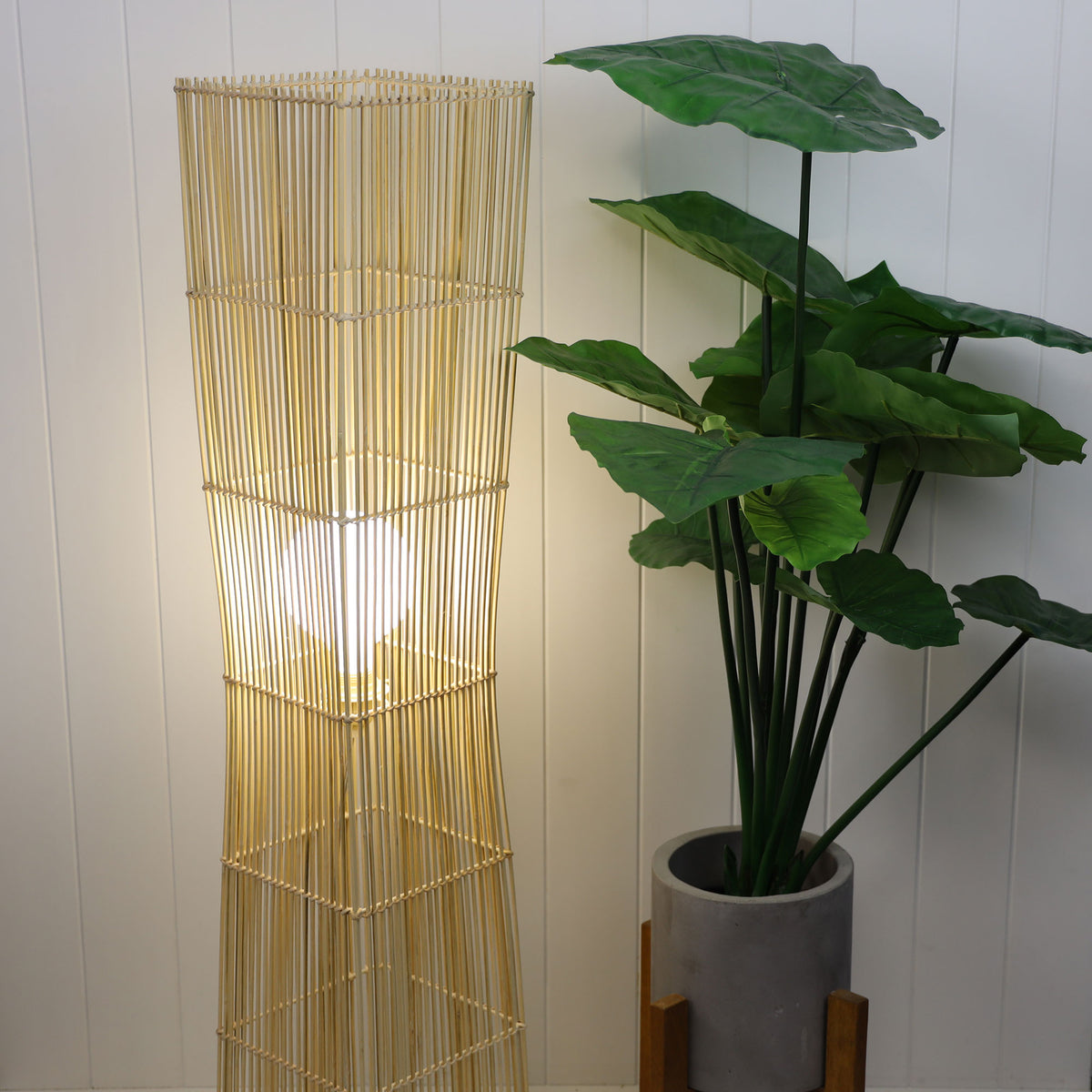 Jambi Rattan Cane Floor Lamp styled in a room