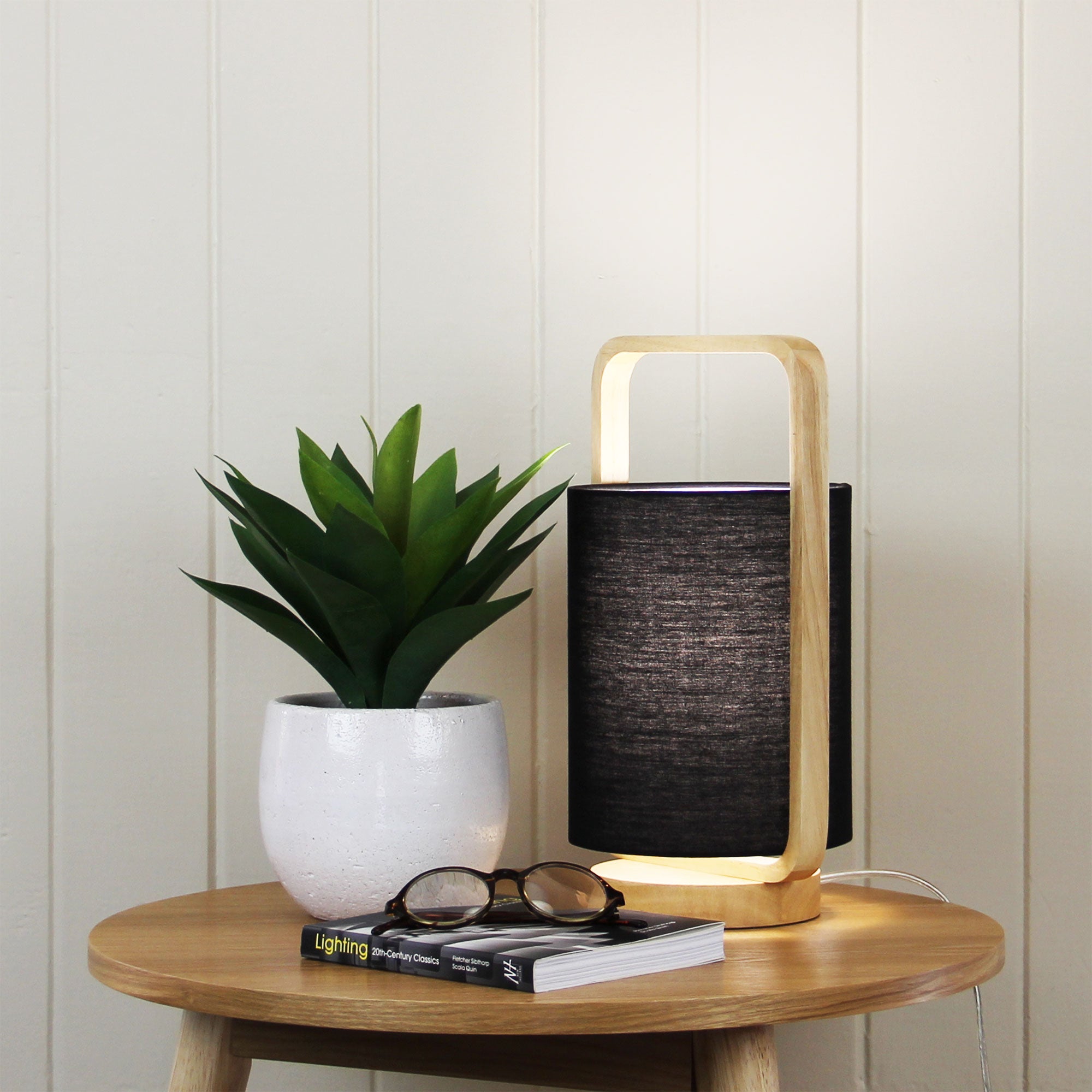 Lucia Natural Timber and Black Cotton Lamp styled in a room