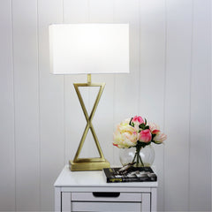 Kizz Antique Brass Complete Bedside Lamp styled in a room