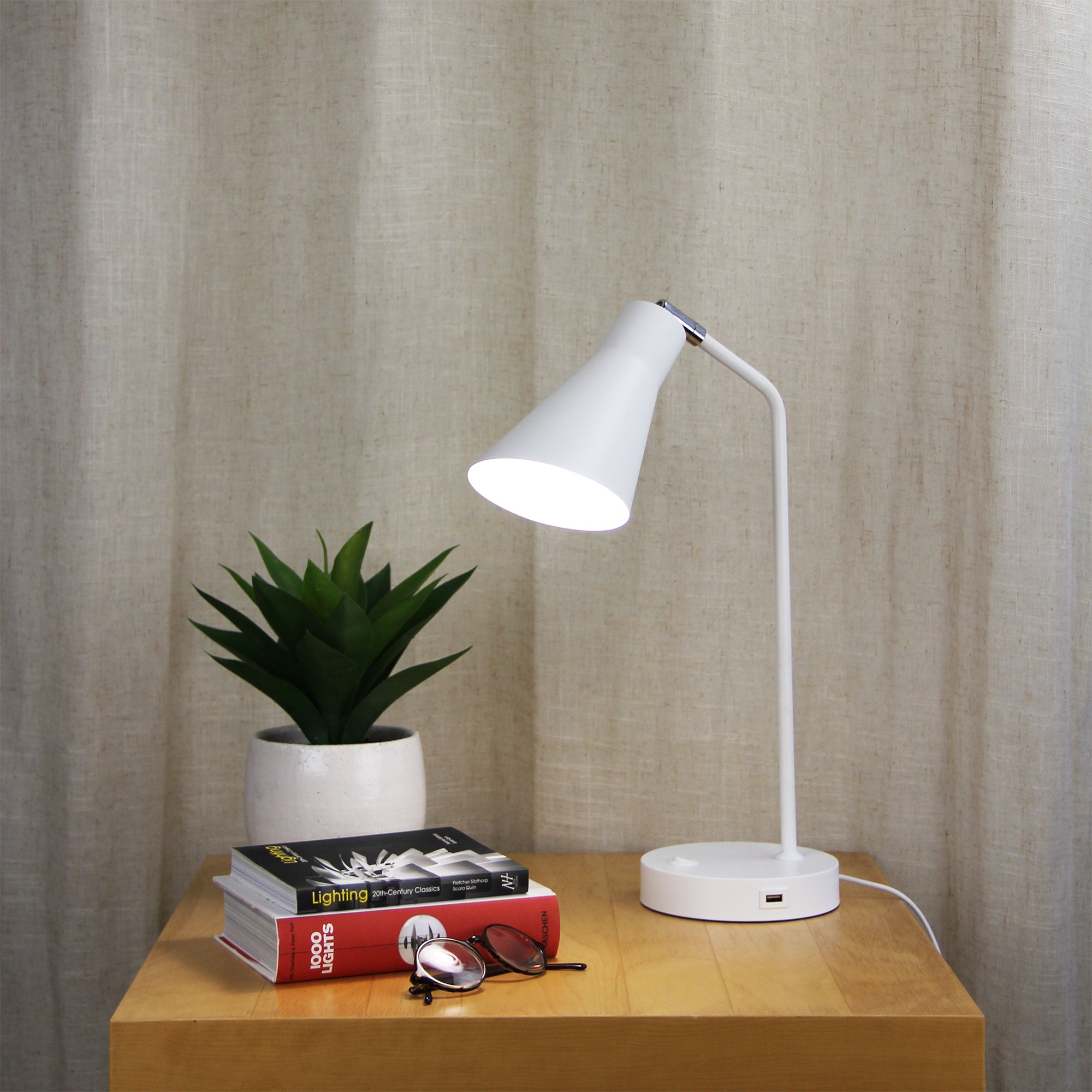 Thor White Desk Lamp with USB styled in a room