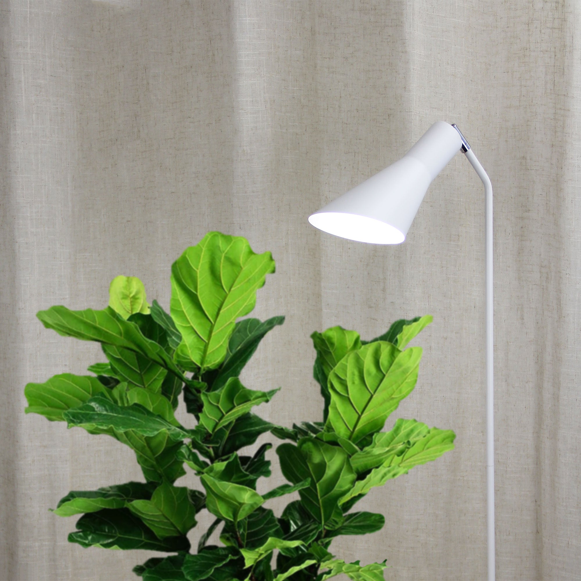 Thor White Floor Lamp styled in a room