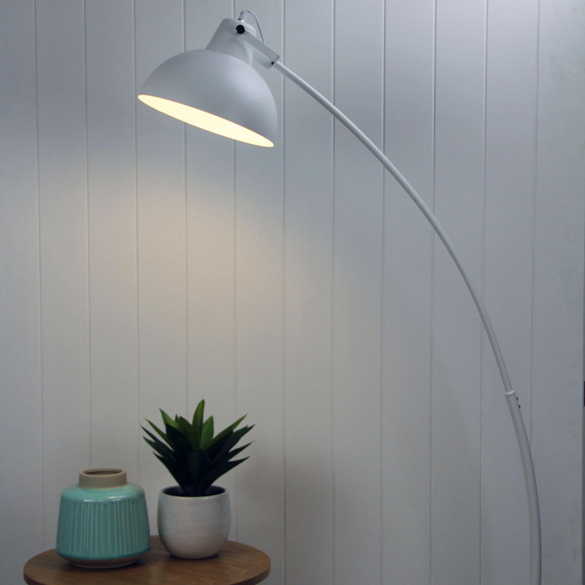 Lago White floor lamp styled in a room