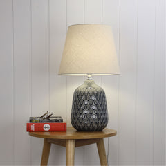 Daria Ceramic Table Lamp with Shade styled in a room
