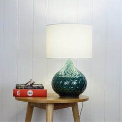 Ridley Ceramic Table Lamp styled in a room