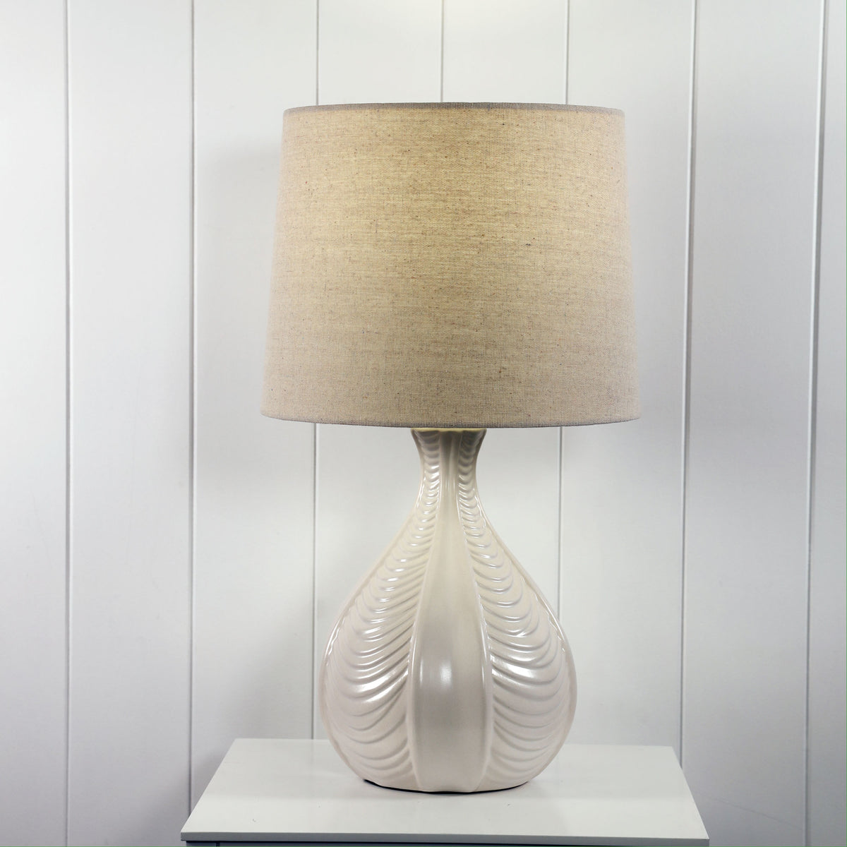 Gaia Ceramic Table Lamp styled in a room