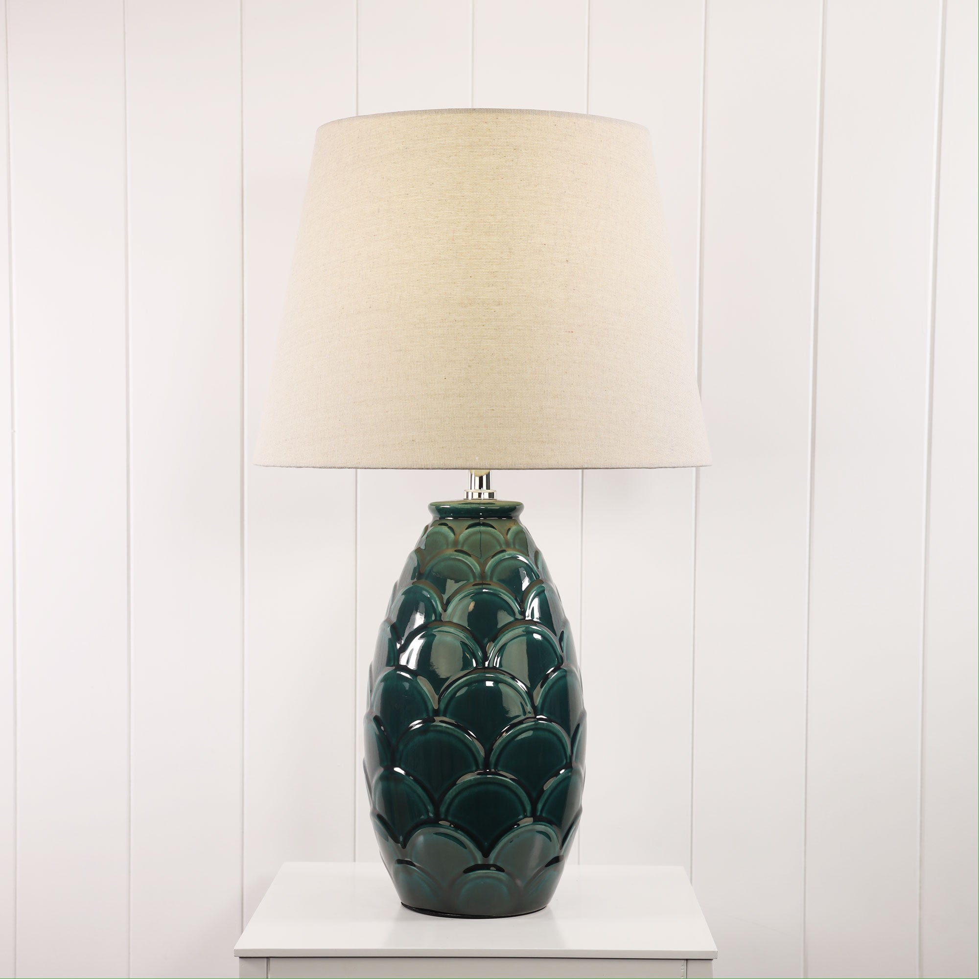 Delphin Ceramic Table Lamp styled in a room