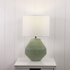 Maya Ceramic Table Lamp styled in a room