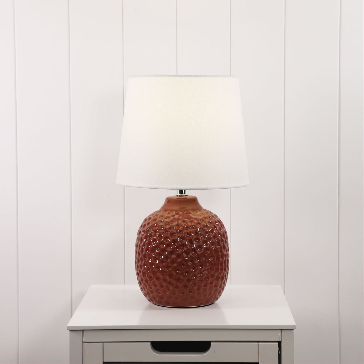 Lilia Ceramic Table Lamp styled in a room