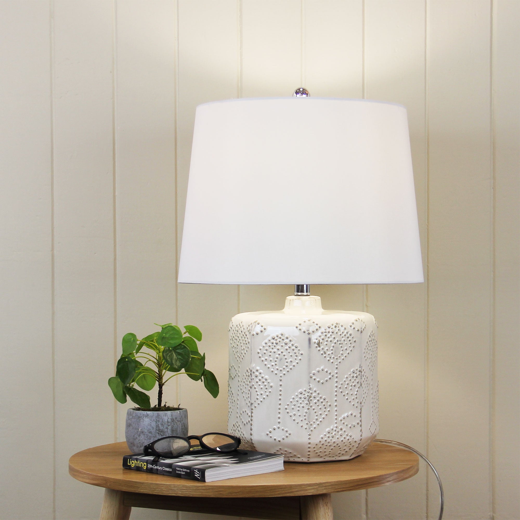 Bikki Embossed Ceramic Lamp with Harp Shade styled in a room