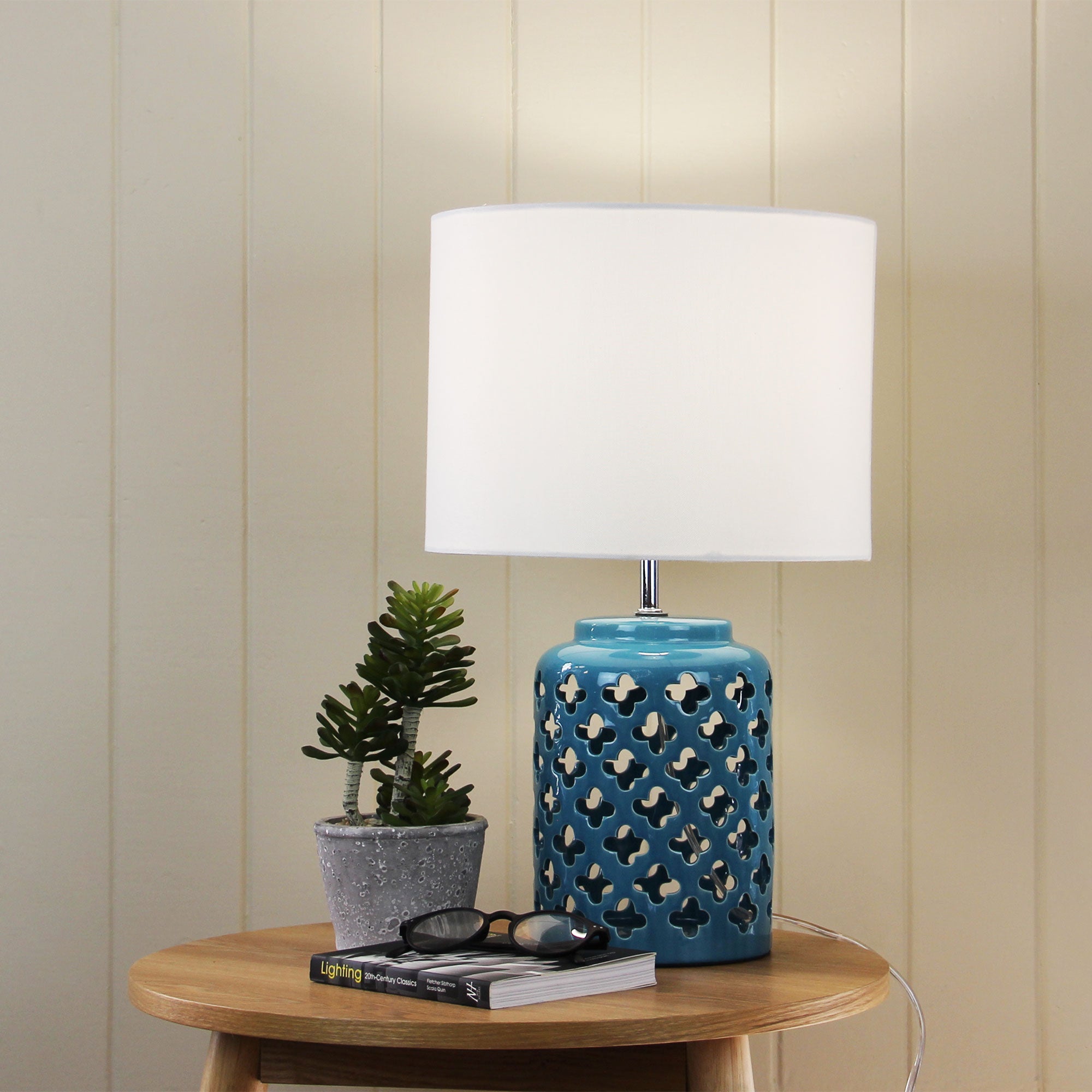 Casbah Teal Moorish Cut Ceramic Table Lamp styled in a room