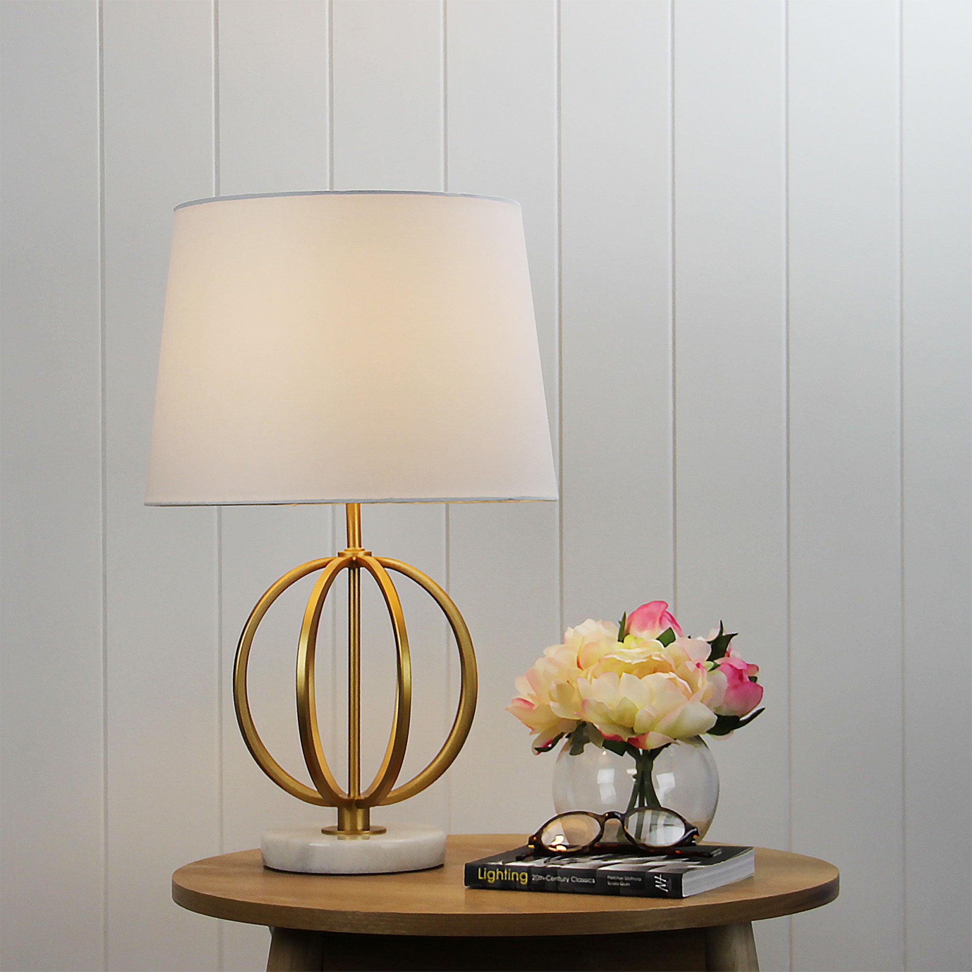 Loxton Gold painted metal/ marble table lamp styled in a room
