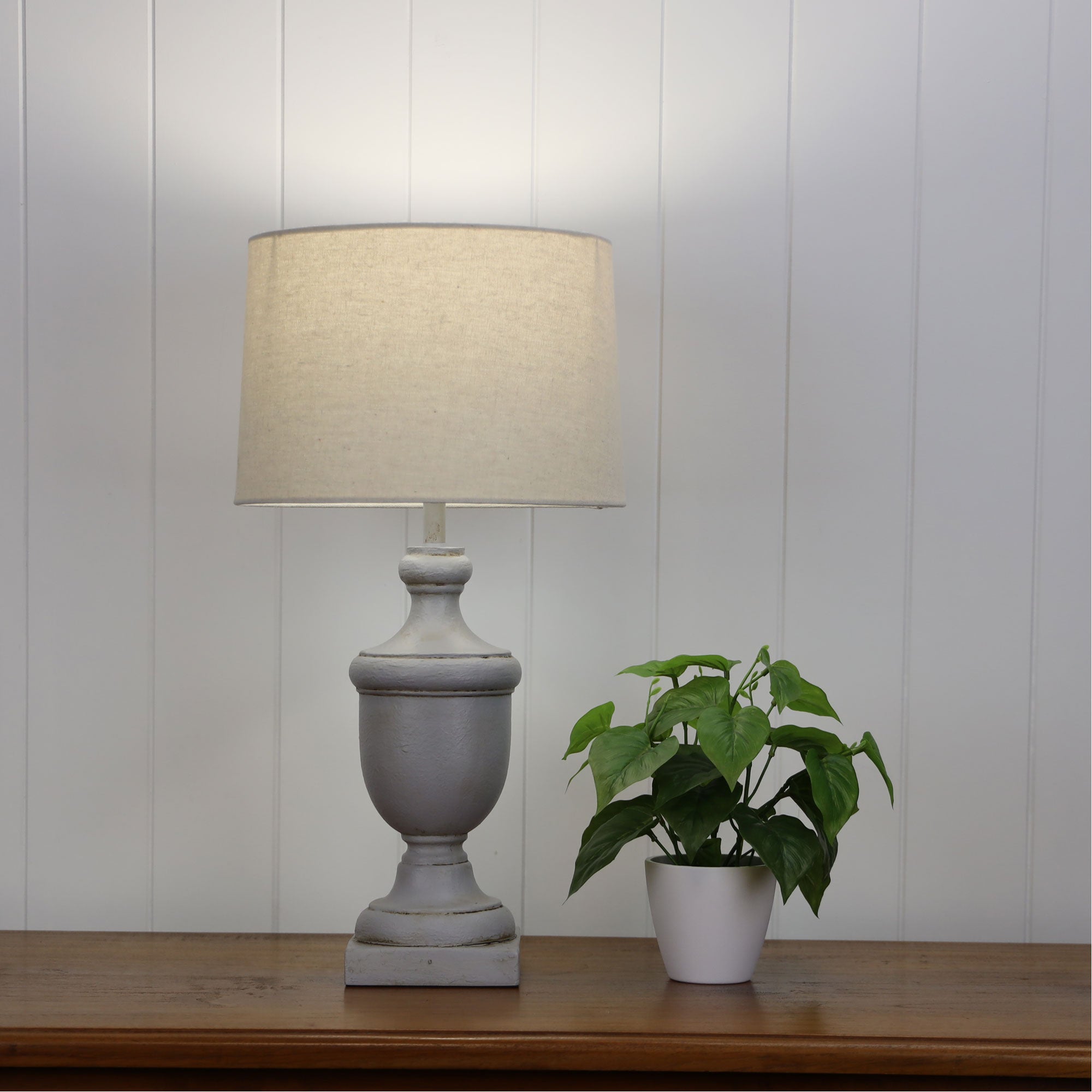 Stafford Complete Table Lamp styled in a room