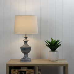 Exeter Complete Resin Table Lamp styled in a room