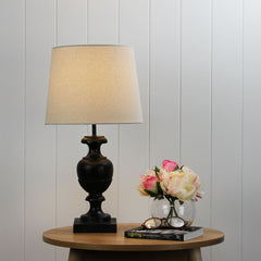 Cadiz Complete Resin Table Lamp styled in a room