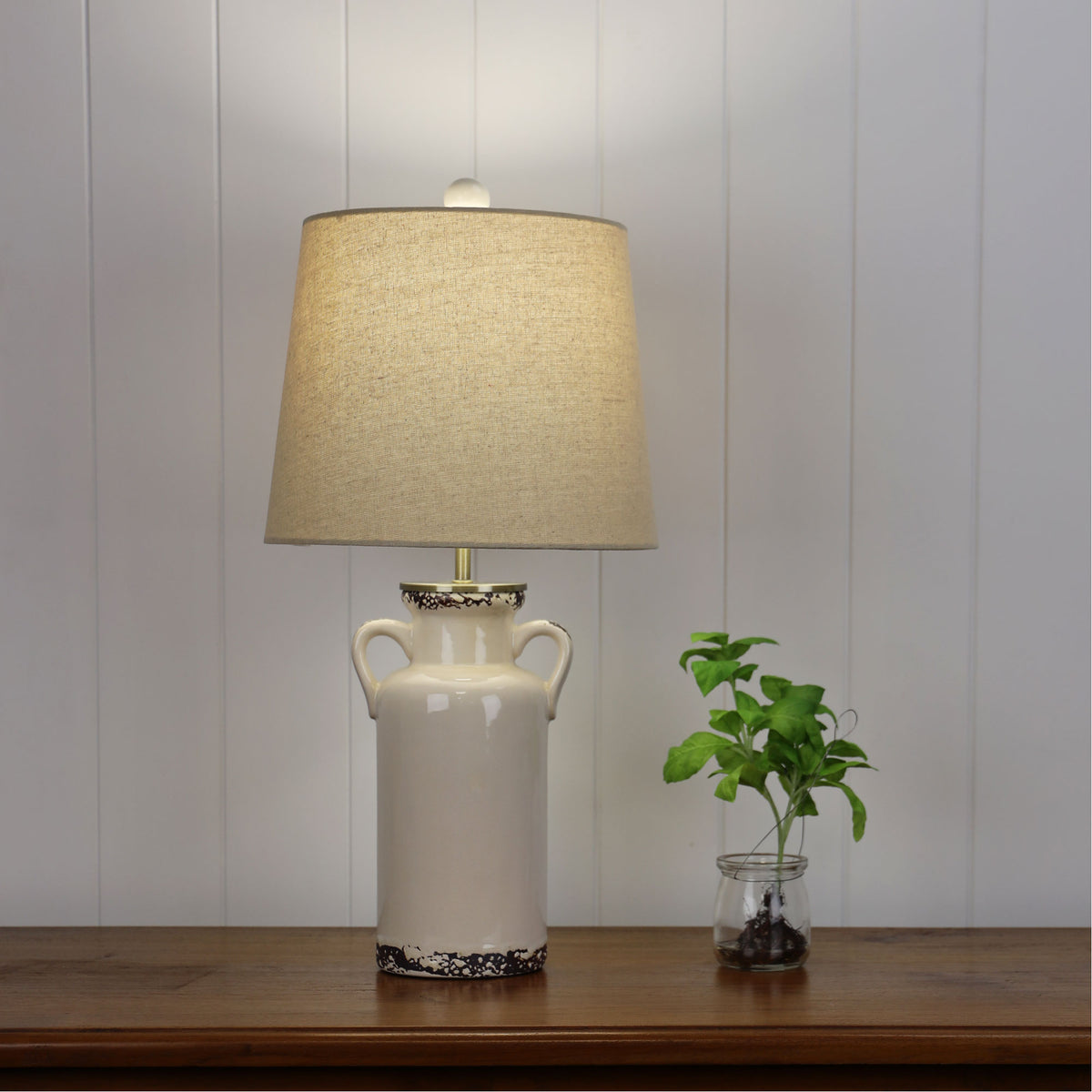 Whitby Distressed Ceramic Lamp with Harp Shade styled in a room