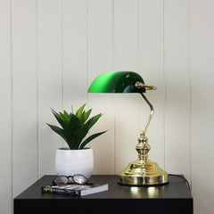 Bankers Brass Plated with Green Glass Shade Desk Lamp styled in a room
