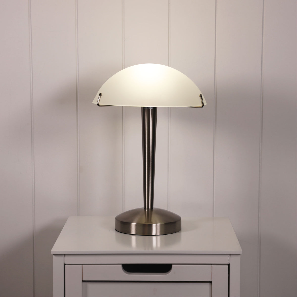 Ruby ON-OFF Brushed Chrome Touch Lamp styled in a room