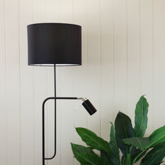 Carmen Floor Lamp with Child styled in a room