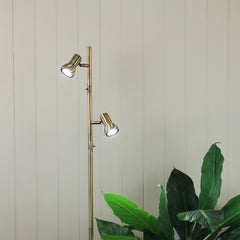 Daxam Twin Adjustable Floor Lamp styled in a room