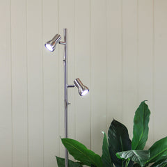 Daxam Twin Adjustable Floor Lamp styled in a room