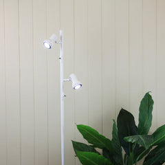 Daxam Twin Adjustable Floor Lamp White styled in a room